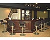 basement bar with dark ceiling
