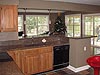 leads to a larger kitchen