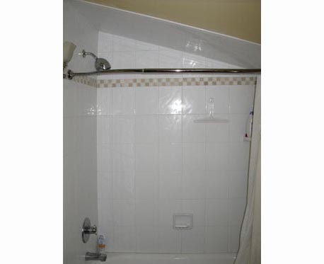 shower under stairs